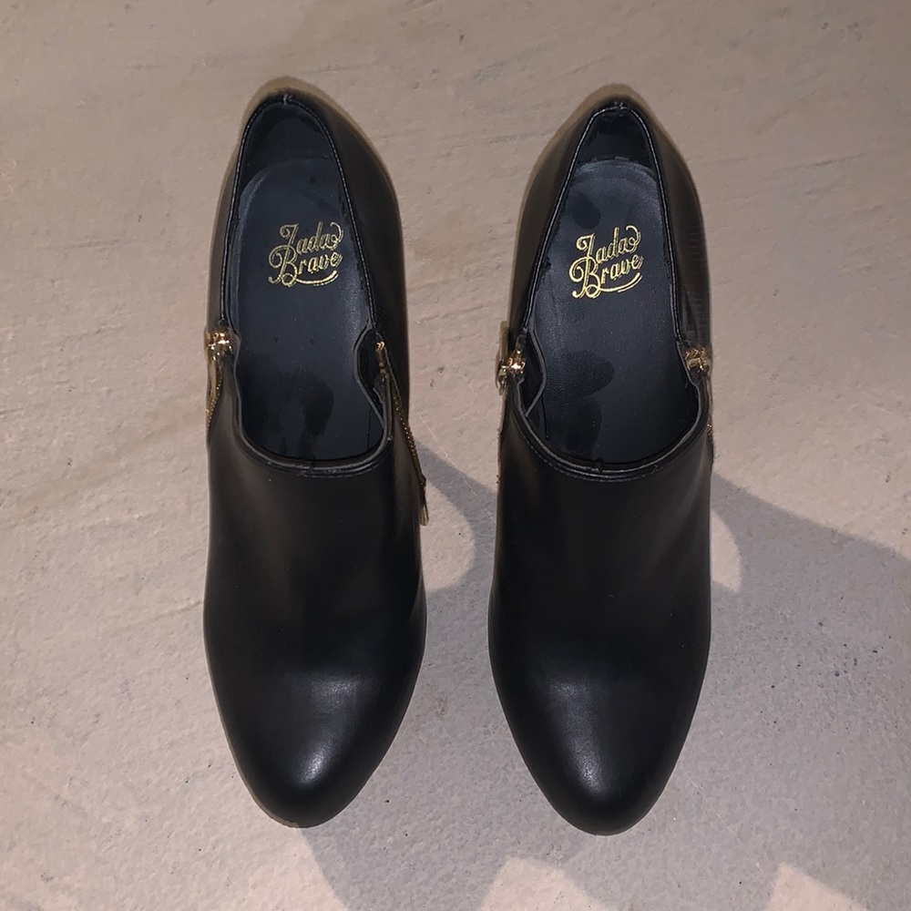 Jada Brave black booties with gold zipper. Size 8.5
